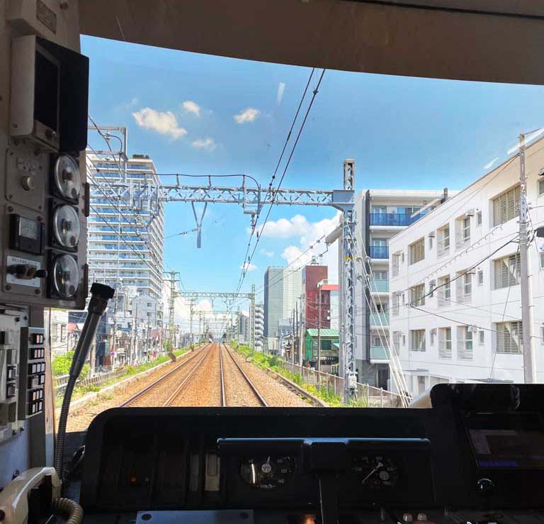 Scenic Views from the Last Carriage of the Keikyu Train Line